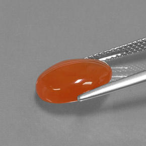 Cornaline orange naturelle coupe ovale, 3,69 ct, translucide