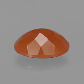 Cornaline orange naturelle coupe ovale, 5,60 ct, translucide