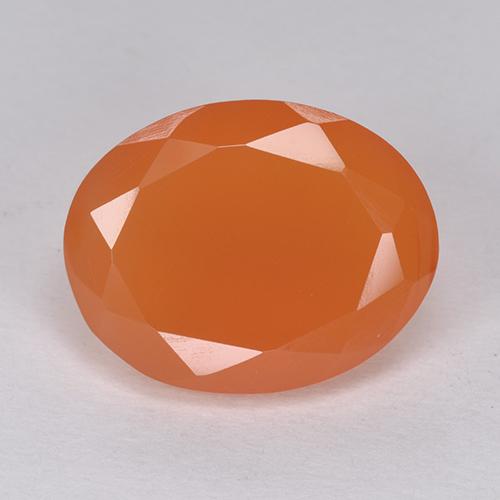 Cornaline orange vif naturelle coupe ovale, 6,38 ct, translucide