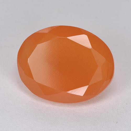 Cornaline orange vif naturelle coupe ovale, 6,38 ct, translucide