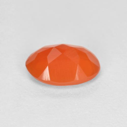 Cornaline orange naturelle coupe ovale, 0,62 ct, translucide