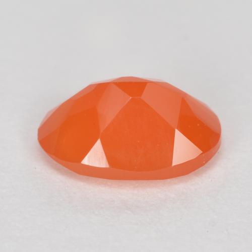 Cornaline orange vif naturelle coupe ovale, 0,72 ct, translucide