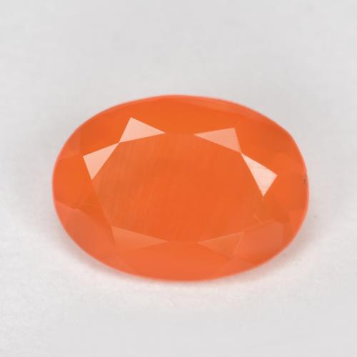 Cornaline orange abricot chaud naturelle coupe ovale, 0,64 ct, translucide