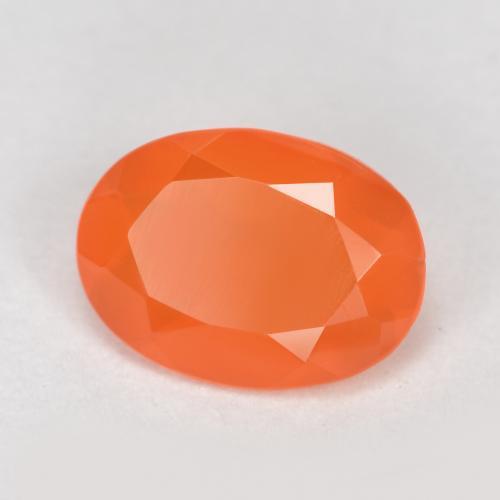 Cornaline orange abricot chaud naturelle coupe ovale, 0,64 ct, translucide