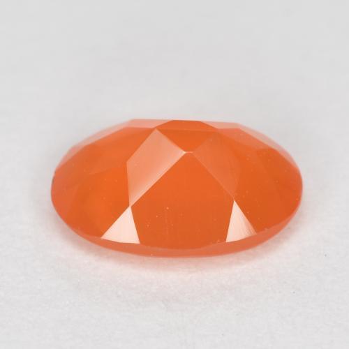 Cornaline orange abricot chaud naturelle coupe ovale, 0,64 ct, translucide
