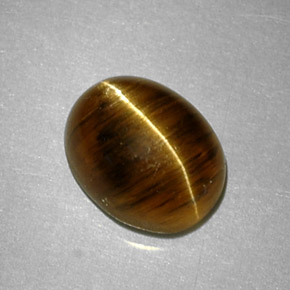 Cat's eye apatite jaune naturelle coupe ovale, 2,64 ct, translucide