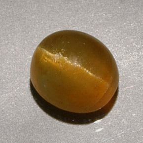 Cat's eye apatite jaune naturelle coupe ovale, 1,90 ct, translucide