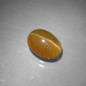 Apatite œil de chat orange naturelle coupe ovale, 1,43 ct, translucide