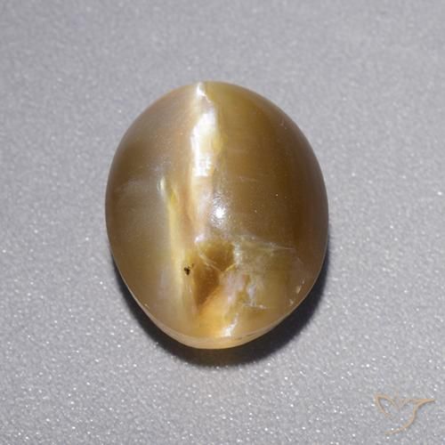Opale œil de chat Marron chaud naturelle Coupe ovale, 4.39 ct, Translucide
