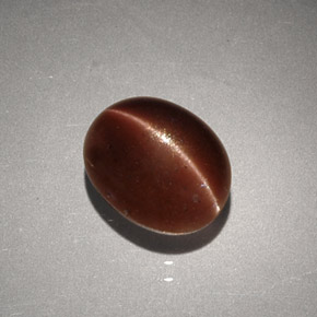 Cat's eye scapolite marron naturelle coupe ovale, 2,56 ct, opaque