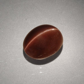 Cat's eye scapolite marron naturelle coupe ovale, 2,56 ct, opaque