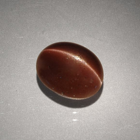 Cat's eye scapolite marron naturelle coupe ovale, 2,56 ct, opaque