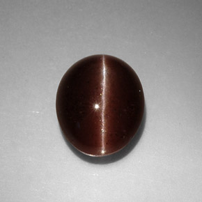 Cat's eye scapolite marron naturelle coupe ovale, 3,52 ct, opaque