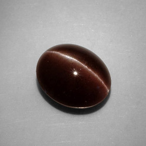 Cat's eye scapolite marron naturelle coupe ovale, 3,52 ct, opaque