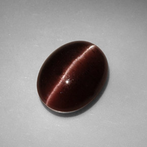 Cat's eye scapolite marron naturelle coupe ovale, 3,41 ct, opaque
