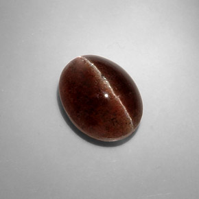 Cat's eye scapolite marron naturelle coupe ovale, 8,31 ct, translucide
