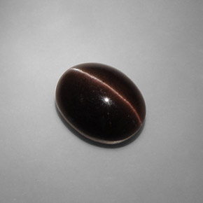 Cat's eye scapolite marron naturelle coupe ovale, 6,90 ct, translucide