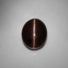 Cat's eye scapolite marron naturelle coupe ovale, 6,90 ct, translucide