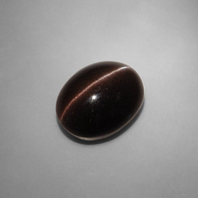 Cat's eye scapolite marron naturelle coupe ovale, 6,90 ct, translucide