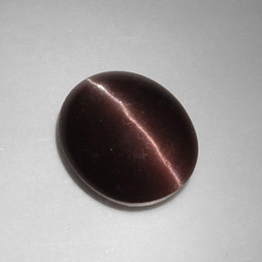 Cat's eye scapolite marron naturelle coupe ovale, 5,88 ct, translucide