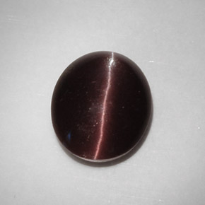 Cat's eye scapolite marron naturelle coupe ovale, 5,88 ct, translucide