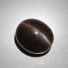 Scapolite œil de chat Marron foncé naturelle Coupe ovale, 5.85 ct, Translucide