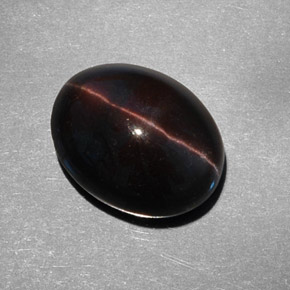 Cat's eye scapolite marron naturelle coupe ovale, 9,21 ct, translucide