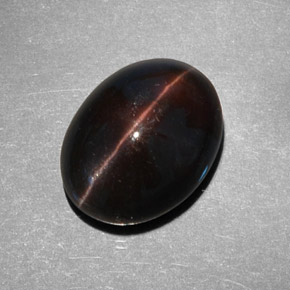 Cat's eye scapolite marron naturelle coupe ovale, 9,21 ct, translucide