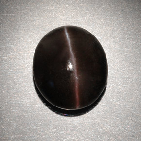 Cat's eye scapolite marron naturelle coupe ovale, 6,82 ct, translucide