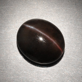 Cat's eye scapolite marron naturelle coupe ovale, 6,82 ct, translucide