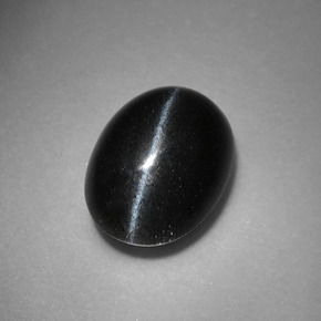 Cat's eye scapolite noir naturelle coupe ovale, 3,37 ct, opaque