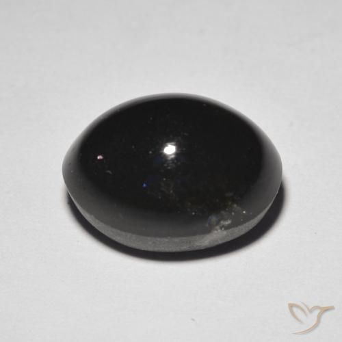 Scapolite œil de chat Brun chocolat noir naturelle ovale, 5.85 ct, Translucide