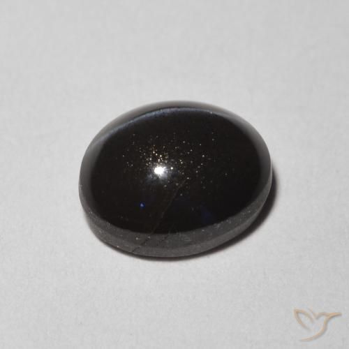 Scapolite œil de chat Noire naturelle ovale, 1.47 ct, Translucide