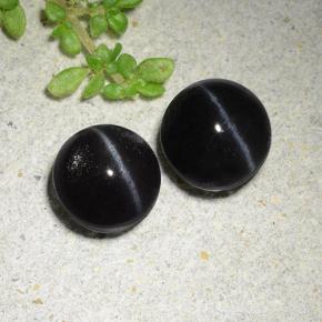 Achetez naturel 3.83ct Noire Scapolite œil de chat gems, Coupe roude, En provenance Madagascar chez GemSelect. En stock, livraison internationale!