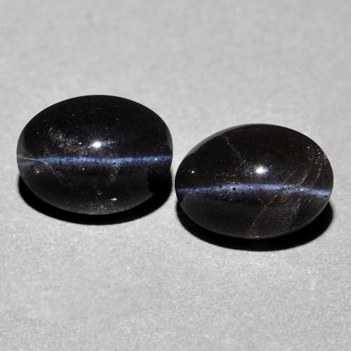 Achetez naturel 4.74ct Noire Scapolite œil de chat gems, Coupe ovale, En provenance Madagascar chez GemSelect. En stock, livraison internationale!