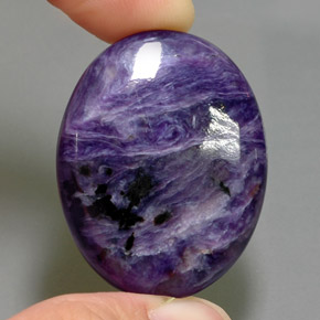 Charoïte Violet naturelle Coupe ovale, 54.26 ct, Opaque