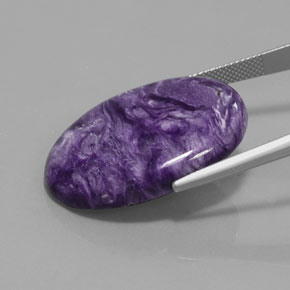 Charoïte violet naturelle coupe ovale, 28,09 ct, opaque