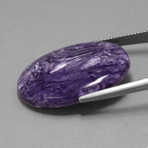 Charoïte violet naturelle coupe ovale, 24,63 ct, opaque