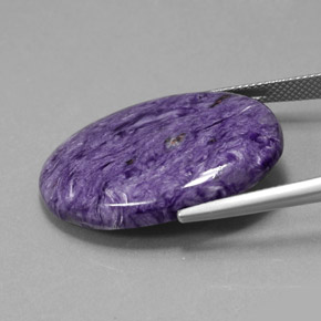 Charoïte Violet naturelle Coupe ovale, 27.59 ct, Opaque