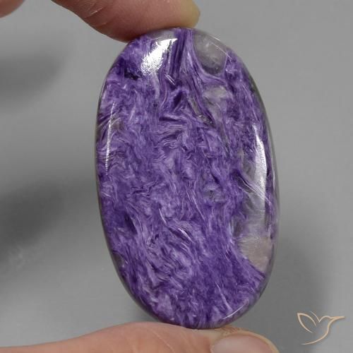 58.38ct Naturel Violet foncé Charoïte, ovale, Opaque