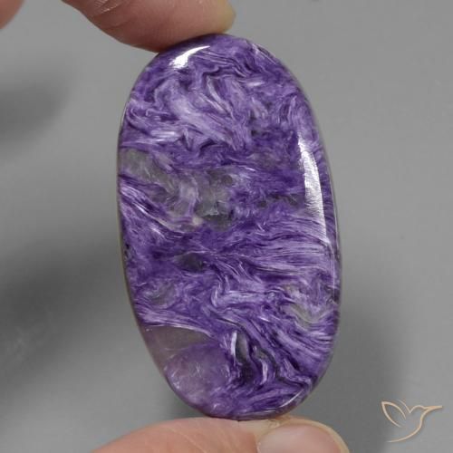 Charoïte Violet pourpre velours naturelle Coupe ovale, 50.99 ct, Opaque