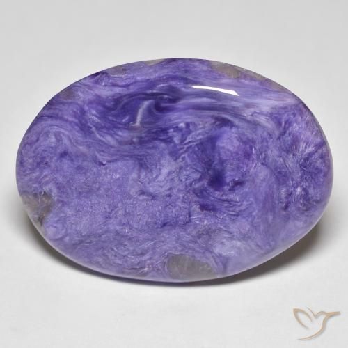 24.55ct Naturel Medium Dark-Violet Charoïte, ovale, Opaque