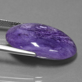 Charoïte violet naturelle coupe ovale, 22,88 ct, opaque
