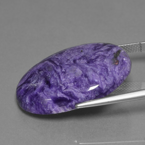 Charoïte Violet pourpre velours naturelle Coupe ovale, 31.76 ct, Opaque