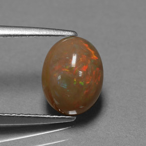 Opale chocolat multicolore naturelle coupe ovale, 1,42 ct, opaque