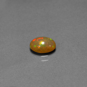 Opale chocolat multicolore naturelle transparent, 0,68 ct, transparent / translucide