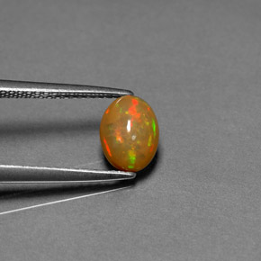 Opale chocolat multicolore naturelle transparent, 0,68 ct, transparent / translucide