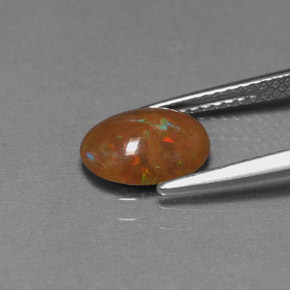 Opale chocolat multicolore naturelle coupe ovale, 0,83 ct, opaque