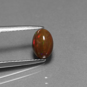 Opale chocolat multicolore naturelle coupe ovale, 0,77 ct, opaque