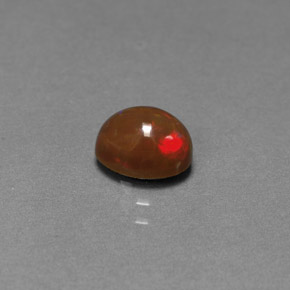 Opale chocolat multicolore naturelle coupe ovale, 0,77 ct, opaque